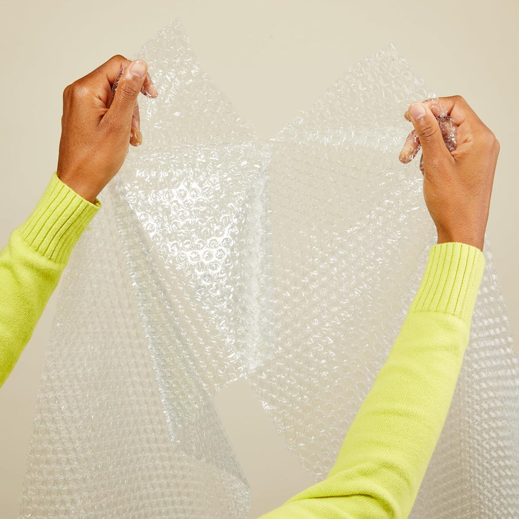 Amazon Basics Bubble Wrap for Moving, Packing, Shipping and Storage, Perforated Protective Cushioning for Fragile Items, 12-inch x 175-ft Long Roll, Small 3/16", Clear